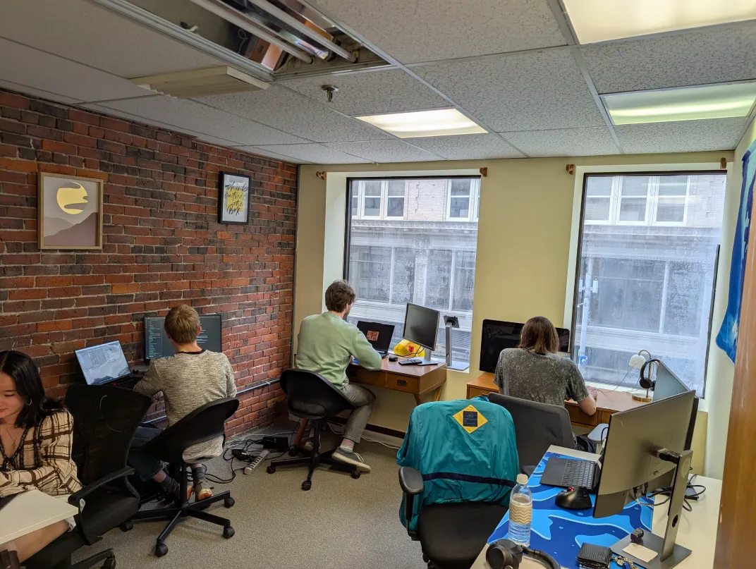 Members working in the left room at Critical Mass!